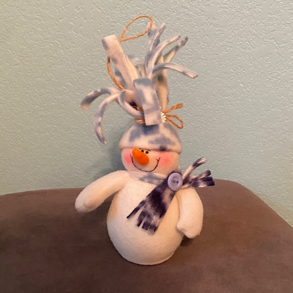 Soft Festive Snowman Figurine with Blue Accents